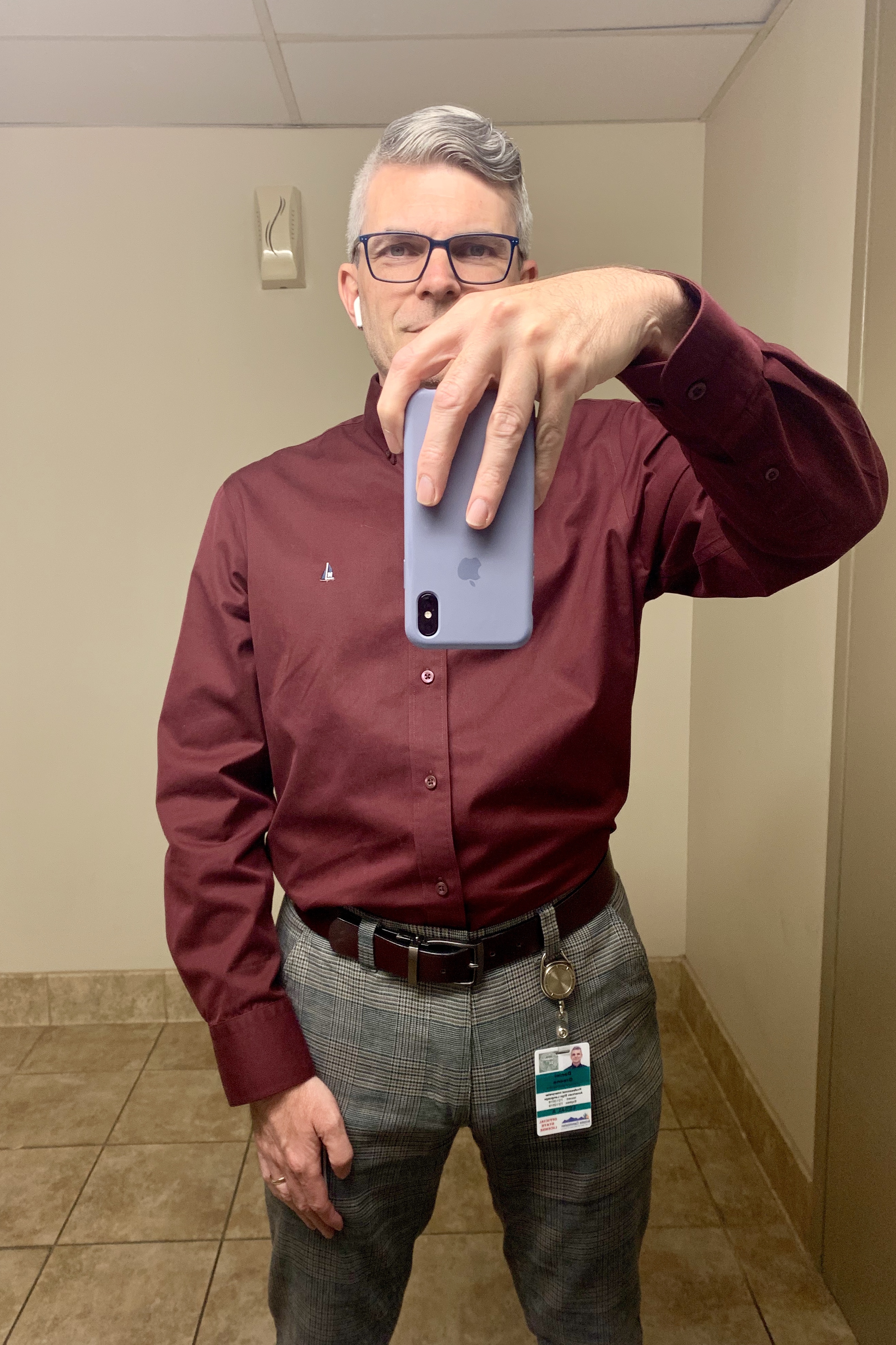 Me (white man with salt-and-pepper hair) wearing burgundy button-down shirt with black-and-brown plaid pants